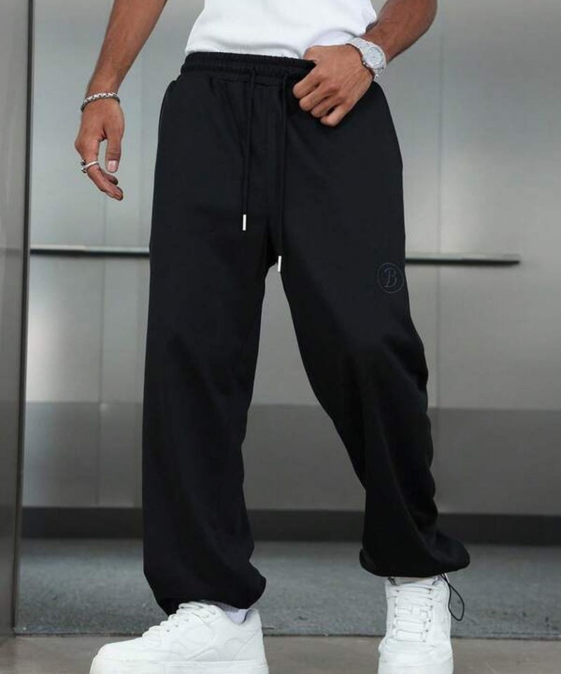 فلاينوف بنطال رياضي رجالي فاخر أسود سادة بقصة مريحة مع رباط للإغلاق وتصميم أنيق - Image 3